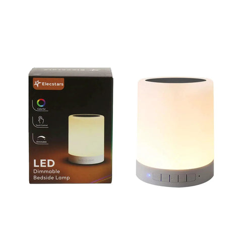 Go-To Smart Touch Bedside Lamp With Bluetooth Speaker Dimmable Color Night Light next to packaging