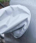 Close-up of No Fuss Magnetic Ev Charger Rain Cover Waterproof Snowproof Sun Shield protecting an EV charger from rain.