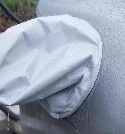 Close-up of No Fuss Magnetic Ev Charger Rain Cover Waterproof Snowproof Sun Shield protecting an EV charger from rain.