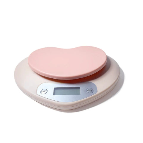 Digital Kitchen Scale With LCD Display For Baking And Cooking Like A Pro, 11 lb Capacity, Pink heart-shaped top view