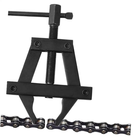 Heavy Duty Motorcycle Chain Adjuster Tool For Bike Gear Tensioning Solid Steel Build shown adjusting motorcycle chain.
