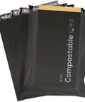 Four black 12x15.5 inch biodegradable shipping bags with "Hi, I'm Compostable" text displayed on packaging.