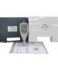 Badass Portable Digital Shore Hardness Tester And Rock Solid Handheld Durometer Gauge With Usb Software For Rapid Rubber And Plastic Testing Sessions Daily Bench Work in a black case and white folder.