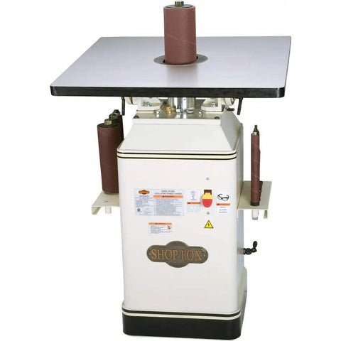 Powerful One Horsepower Oscillating Spindle Sander Featuring Rock Solid Cast Iron Table and Roomy Four Inch Dust Port for smooth finishes.