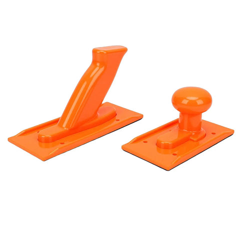 Two orange ABS push blocks for woodworking; visible handheld and knob grip design for safety on table saw, jointer, router, bandsaw.