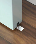 Close-up of 6.6Ft Top Mount Stainless Steel Barn Door Hardware Track Kit For 36 To 40 Inch Wide Single Door showing floor guide installation.