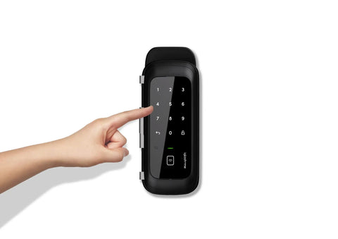 Keyless Entry Smart Glass Door Lock With Bluetooth Code App And Fob For 12mm Frameless Swing Doors No WiFi Needed Instant Remote Access Electronic Keypad Time Based PINs RFID Tags Easy Clip On Install with hand pressing keypad on black lock.