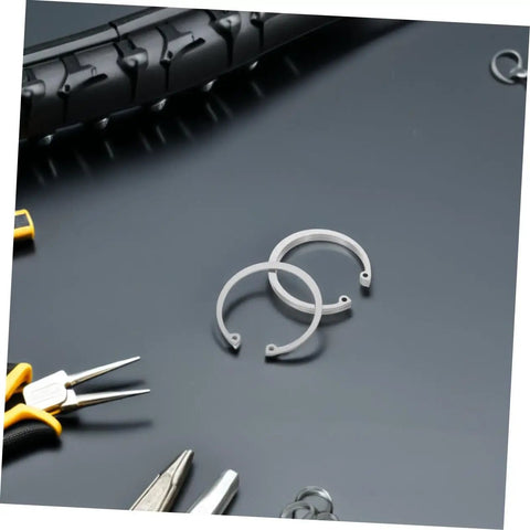 5 Piece Stainless Steel C Clip Retaining Ring Kit for Grooved Shafts Easy Install Snap Ring Set on a dark backdrop