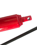 Close-up of red 8-ton hydraulic jack cylinder with clevis lug and long ram
