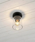 Industrial Semi Flush Mount Ceiling Light With Cylinder Glass Shade And E26 Base installed on white ceiling