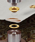 Installation of grommet using press tool on fabric; demonstrates usage of 00GNWBDBC1440 Sheet Metal Grommet And Neck Washer Set in panels.