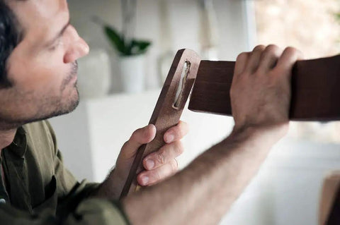 Person using Epoxy Repair Putty For Quick Fixes Handy Two Part Moldable Adhesive That Bonds To Damp Surfaces And Cures Underwater