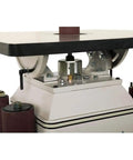 Powerful One Horsepower Oscillating Spindle Sander Featuring Rock Solid Cast Iron Table And Roomy Four Inch Dust Port For Knockout Smooth Finishes And Easy Cleanup Every Time - close-up view of the motor and cast iron table.