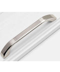 Brushed Nickel Cabinet Handles Three Pack With 64 Millimeter Hole Centers Euro Style Drawer Pulls installed on white surface