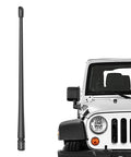 13 Inch Flexible Rubber Antenna Replacement For Jeep Wrangler 2007-2026 And Gladiator 2020-2026 With Internal Copper Coil Shape Memory Bendable Design For Kickin Clearer Radio Reception next to white Jeep