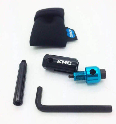 Ultra Compact Bike Chain Tool For All Speeds Including 12 Speed With Pin Directed Force laid out with pouch and hex key