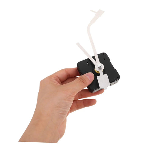 Vinyl Record Clock Replacement Parts Kit With Movements, Hands, And Long Shafts in hand, showcasing durability and precision.