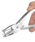 Hand holds a one handed hole punch for paper, 6 sheet capacity, 3.175mm hole, chrome plated handheld puncher with scrap collector