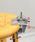 Tiny Bench Vise Clamp For Workbench And Diy Projects Universal Drill Press Vise clamped on a carved round wooden table