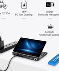 Pocket Sized Handheld Laptop Boosted By A Slick Seven Inch Display Running Windows 11 Home powered on with fast charging cable connected.