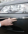 Installed Cowles Custom chrome body molding on gray car bumper; 1/2 in x 18 ft flexible PVC