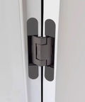 Rock Solid Hydraulic Invisible Door Hinges With Silent Close Mechanism Smooth Riding Zinc Alloy Cabinet Fittings No Sweat Installation Black Pair Heavy Duty Grade installed in cabinet.