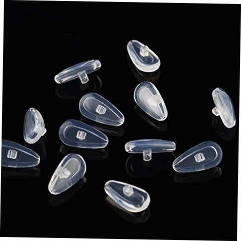 Close-up of 15mm silicone nose pads from Do It Yourself Eyewear Repair Kit With 15mm Silicone Nose Pads Stainless Steel Screws Replacement Parts Lens Cloth And Sturdy Plastic Storage Case For Quick At Home Glasses Repairs