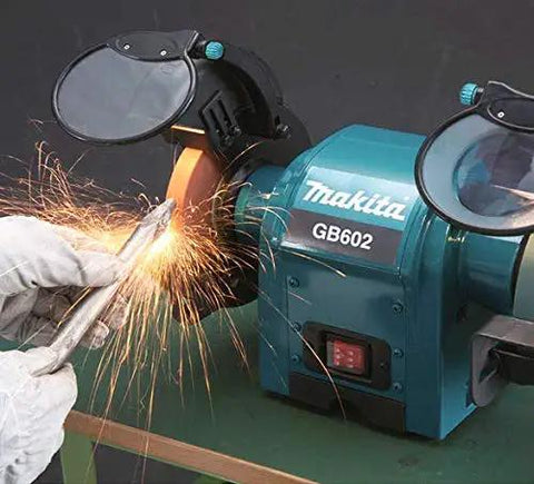 Heavy Duty 250 Watt Bench Grinder Featuring Dual Illuminated Work Lights And Rock Solid Base For Smooth Metal Grinding And Fast Tool Restoration In Any Home Garage Setup with sparks flying during use.
