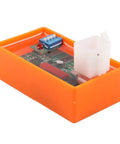 5 Pin AC CDI Motorcycle Ignition Box With Dip Switch For 4 Stroke Models, Orange Unit, side view with circuitry visible