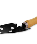 Two Piece Garden Tool Set With Hand Rake And Trowel Durable Carbon Steel Blades Smooth Wooden Handles With Hanging Holes Perfect Mother's Day Gift Cute Picture Dot Design For Practical Gardeners showing a trowel with a dot pattern