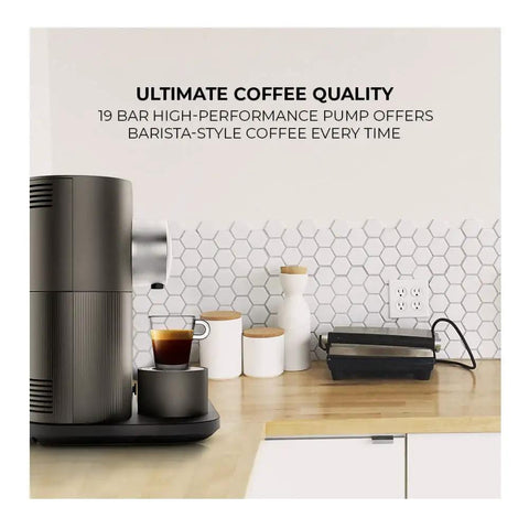 Prime Smart Espresso Machine Pulling Killer Shots On The Fly With Bluetooth App Sync Rotating Dial High Pressure Pump And Zero Hassle Daily Cleaning In Sleek Anthracite Grey on kitchen counter.