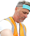 Man wearing Big Time Absorbent Sweat Bands For Head That Keep You Chill And Dry Through Heavy Training Sessions Blue Cellulose Straps.