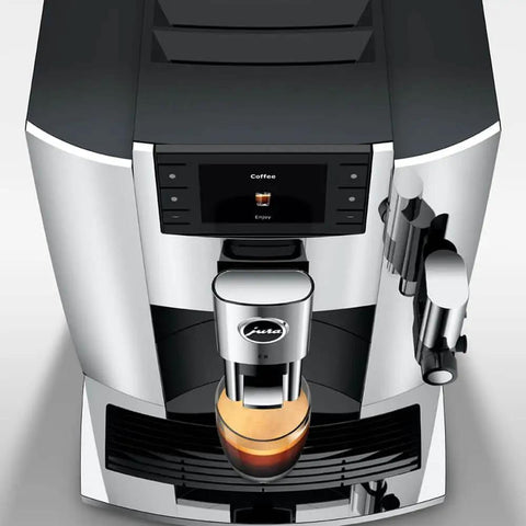Level Up Your Daily Grind With This Sleek Chrome Automatic Coffee Machine Boasting One Touch Operation Built In Grinder And Rich Foam Frother For A Real Deal Barista Experience Certified Refurbished top view of sleek chrome coffee machine with digital display and brewed coffee.