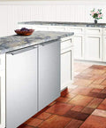 Frost Free Under Counter Upright Freezer In Brushed Stainless Steel slides into 24 inch spot in a modern kitchen.