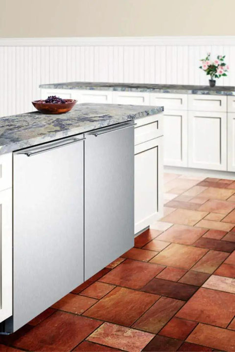 Frost Free Under Counter Upright Freezer In Brushed Stainless Steel slides into 24 inch spot in a modern kitchen.