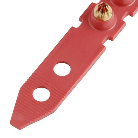 Close-up of a Red Shot.27 Powder Actuated Fastener Cartridges Set Of Six for construction, showing cartridge details for concrete use.