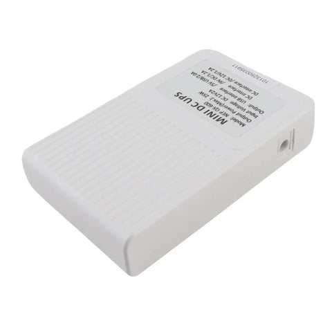 Mini UPS Battery Backup 8000Mah For Router Modem And Wifi Gear With 25W Output, compact white body for reliable power.