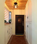 Dope Industrial Semi Flush Mount Ceiling Light Featuring A Sick Black Cage Design And Rustic Vintage Vibe Perfect For Compact Rooms With Easy E26 Led Compatibility And Badass Farmhouse Decor Accents illuminating a hallway.