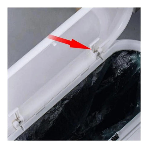 Close-up of a silver stainless steel 3-coil torsion spring on a garbage can lid hinge.