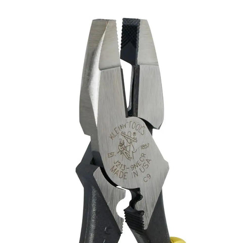 Close-up view of Journeyman Pliers With Crimp Die Behind Hinge For Superior High Leverage Crimping, Side Crimp Design For Non Insulated Connectors Lugs And Terminals, 9 Inch Made In USA, Rivet Closer To Cutting Edge Delivers 46 Percent More Cutting And Gripping Power, showing the engraved details and knurled jaws.