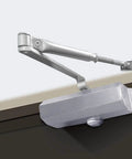 Hydraulic Door Closer With Soft Close And Adjustable Arm installed on a metal door