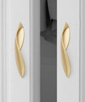Pearl Gold Arcuate Cabinet Pulls 5 Inch Curved Handles For Drawers And Cabinets, Solid Zinc Alloy, Installed on White Cabinet
