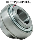 Maple Ace UC207-22 insert bearing close-up with 1-3/8 in bore, spherical OD, R3 triple-lip seal
