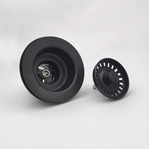 Matte Black Three And A Half Inch Sink Drain Assembly With Basket Strainer And Stopper For Quartz Granite Or Fireclay Kitchen Sinks Easy Install Durable Polymeric Construction, showing drain and strainer on white background