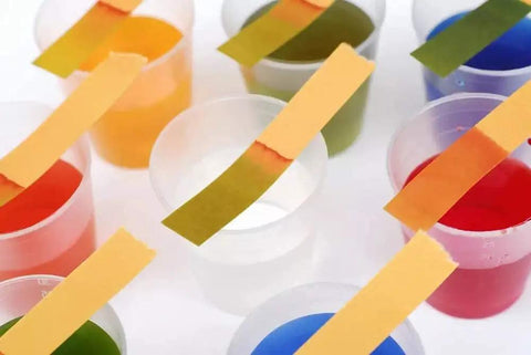 PH Test Strips 1 To 14 Full Range Litmus Paper For Garden And Soil in various liquids for color comparison
