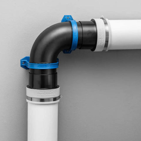 Ready Mount 4 Inch 90 Degree Dust Hose Elbow For Dust Collection Systems in aluminum with blue brackets connecting two hoses