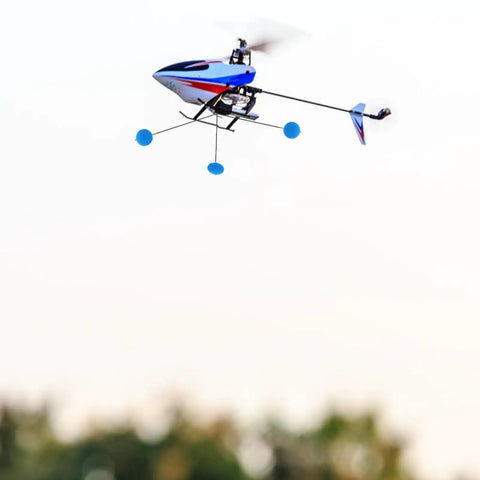 Three Set RC Helicopter Training Gear Kit With Blue Frame And Sponge Ball Practice Balls For Easy Learning And Flying in action.
