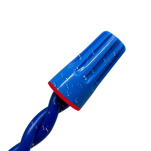Close-up of blue waterproof landscape wire connector from the 45-piece UL listed, weatherproof silicone sealed kit for outdoor lighting.