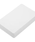 Twenty Piece Bundle Of Slick Blank White Pvc Id Cards With Heavy Duty Waterproof Coating And Hassle Free Printing For Quick Employee Badges And Double Sided Photo Cards In Sharp Resolution, stacked at an angle.