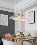 Wood Metal Colorful Pendant Light, Simple Farmhouse Lighting, Indoor Rustic Fixture, Gray Yellow hanging above dining table.